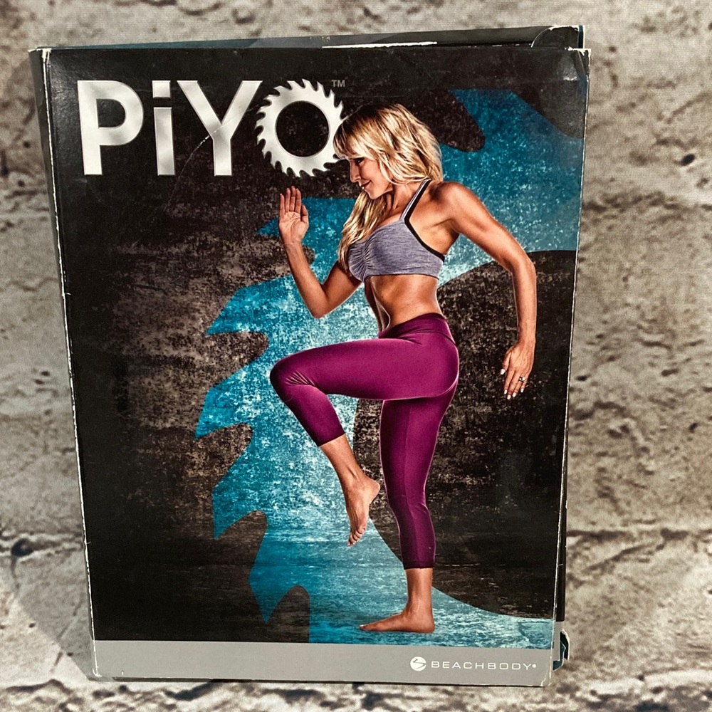 Beachbody PiYo Fitness DVDs with workout calendar and eating plan